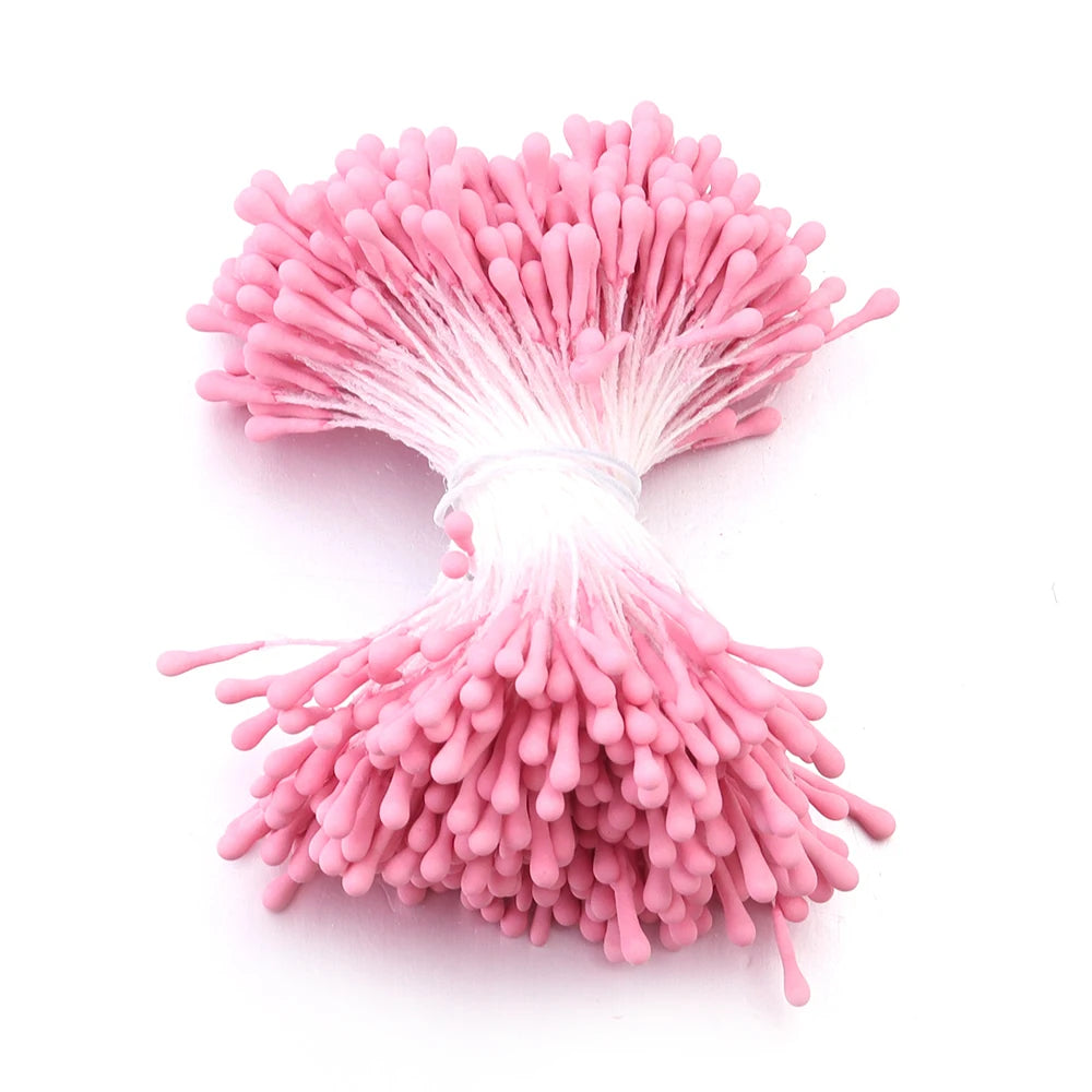 A cluster of pink artificial flower stamens used for DIY decoration.