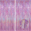 Vertical backdrop of shimmering metallic foil tinsel fringe in shades of pink and purple.