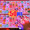 A close-up of 50 glow rings in various Halloween themes, including pumpkins, skulls, and spooky faces, displayed in a red box