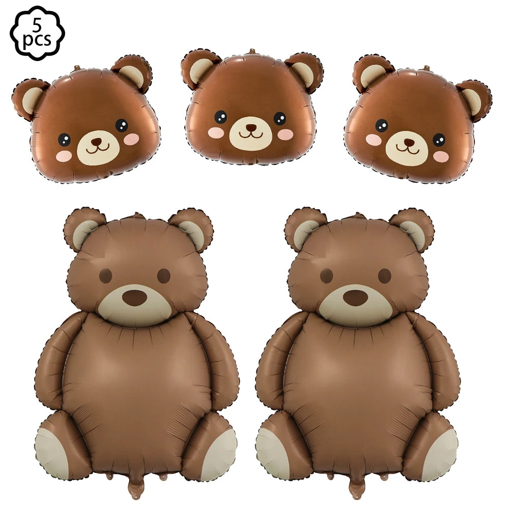 Five brown inflatable teddy bears for a birthday party banner
