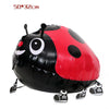 A red and black cartoon ladybug foil balloon with antennae and a black body, displayed for party decor.