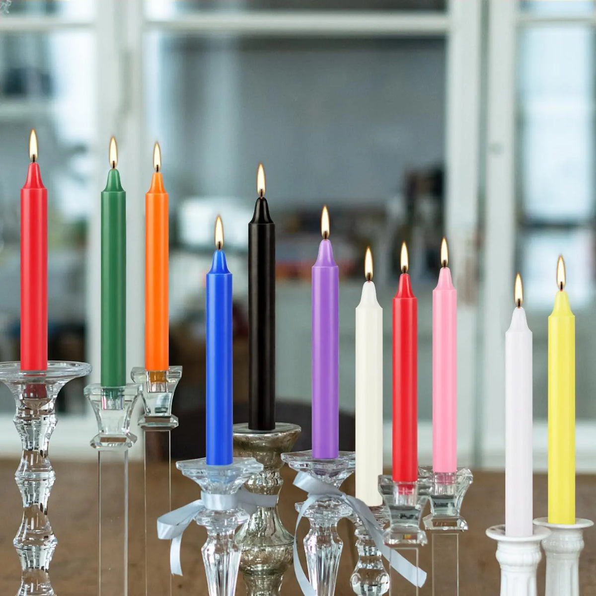 A collection of twenty hand-poured soy wax stick candles in various colors including red, green, orange, blue, and purple