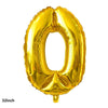 A large, gold foil balloon shaped like the letter O