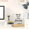 An inspirational acrylic desktop sign with the text You are absolutely positively incredibly amazing displayed on a white sur