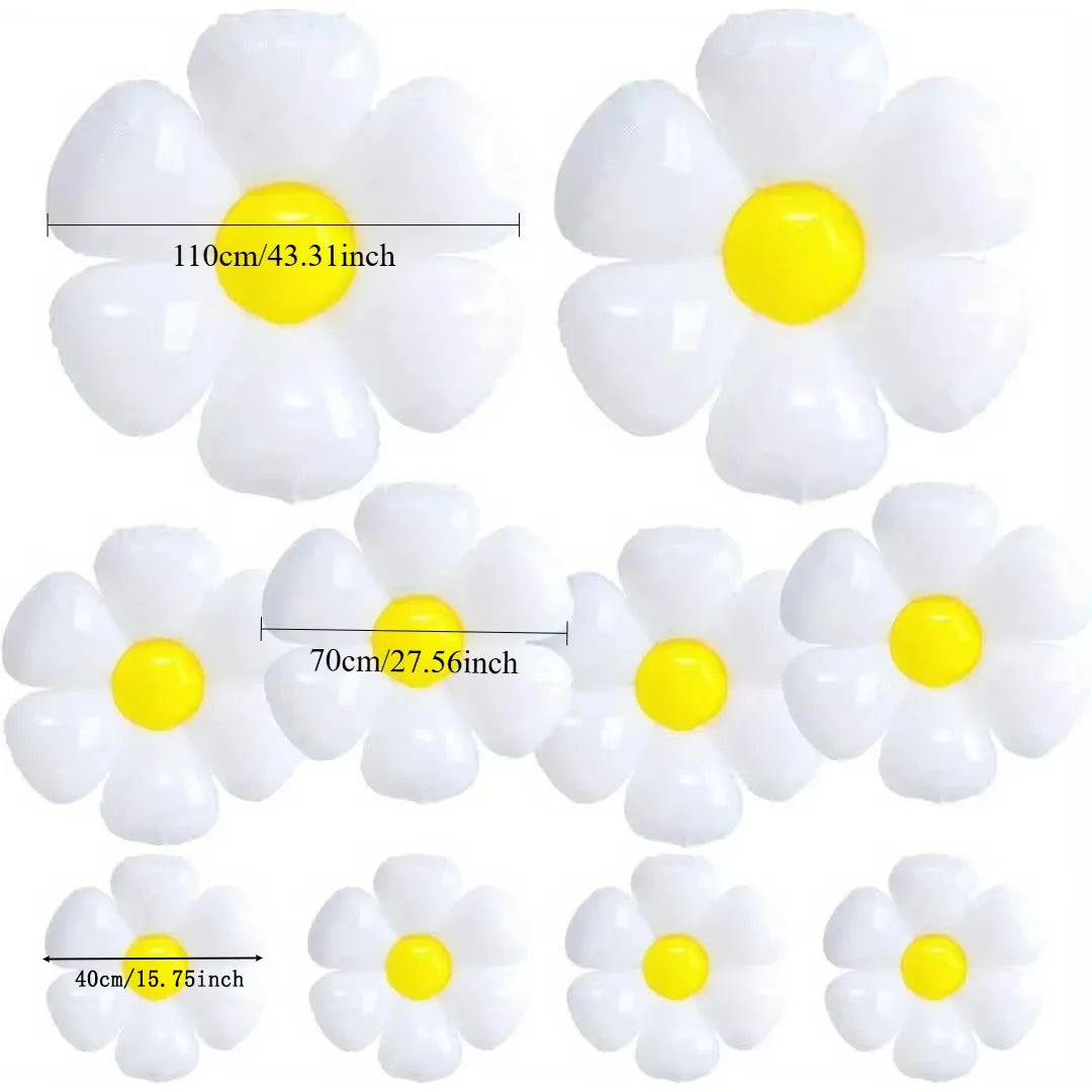 A collection of white and yellow daisy-shaped balloons for summer celebrations.