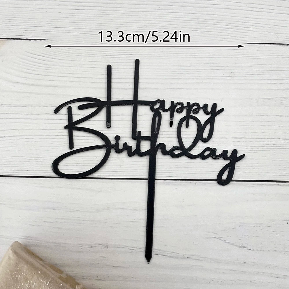 Black acrylic birthday cake topper with gold lettering and a stick, measuring 13.3cm/5.24in.