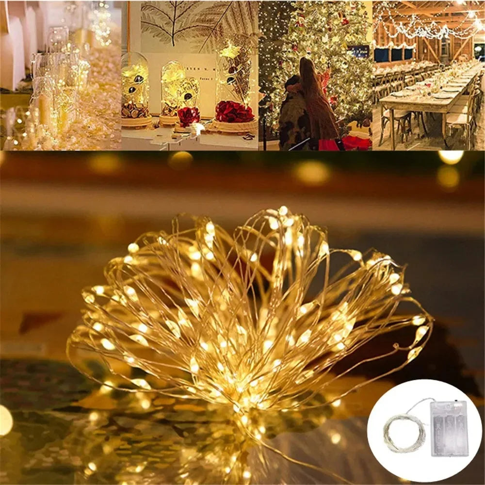 A bundle of warm yellow fairy string lights with thin wires lying on a reflective surface.