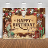 A rustic western backdrop featuring a skull, cacti, and decorative string lights for a birthday theme.