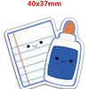 A small white bottle with an orange cap next to a piece of lined paper, indicating a craft embellishment.