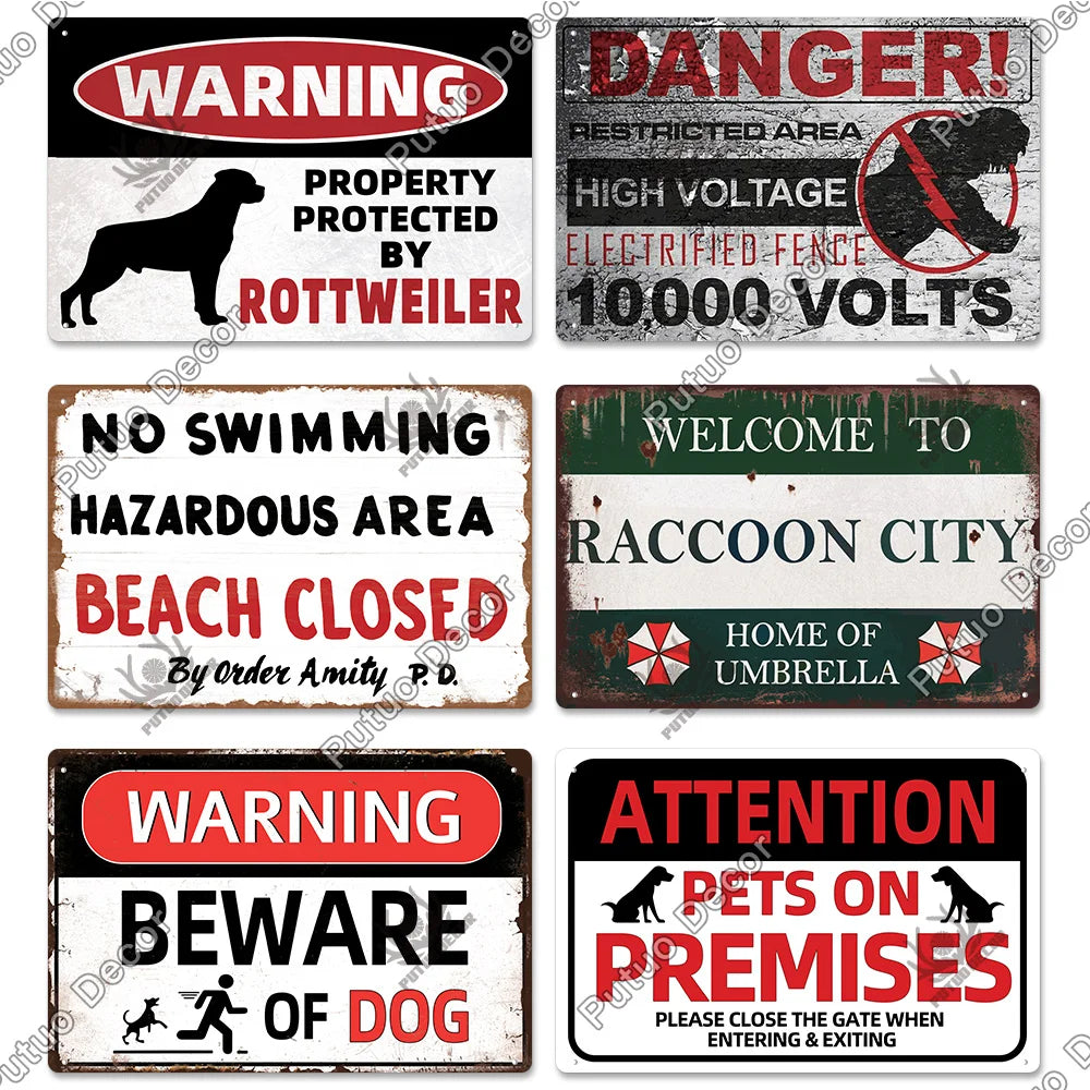 A collection of vintage warning metal signs featuring text like WARNING DANGER and ATTENTION PETS ON PREMISES