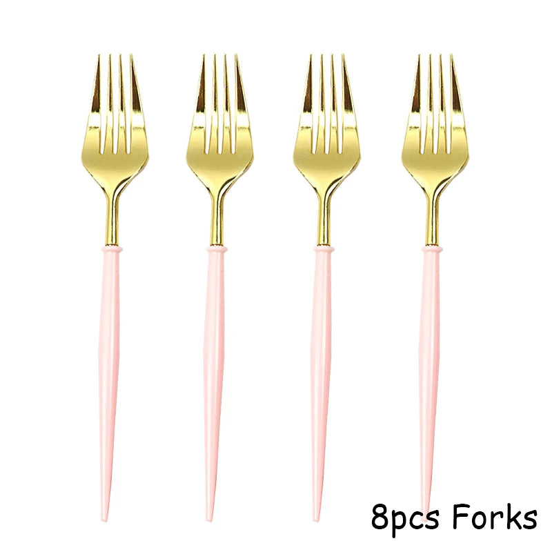 Eight pieces of gold and pink disposable forks for party tableware