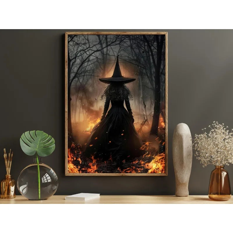 Dark witch silhouette in a pointed hat stands amidst a fiery forest scene on canvas wall art