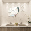 Elegant 3D acrylic heart wall art decals displayed on a white marble wall above a modern vanity.