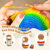 Hand-crafted crochet animal doll with a positive message card being held by hands.