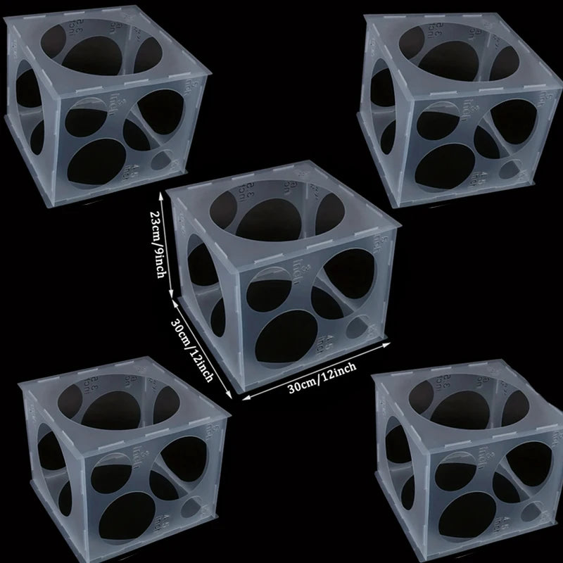 A set of clear plastic boxes with various hole patterns used for balloon sizing and party decor.