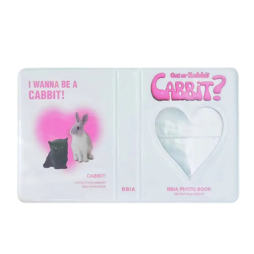 A clear photo album featuring a pink heart design and a rabbit illustration with the text Cabbit