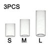 Three clear glass cylindrical candle holders labeled S, M, and L sizes.