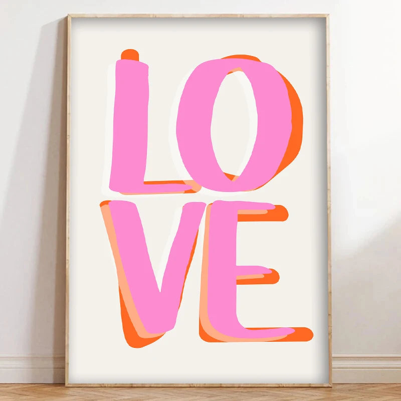 Canvas wall art featuring the word LOVE in bright pink and orange gradient lettering.