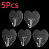 Five clear, heart-shaped self-adhesive hooks are shown against a black background.