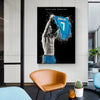 A framed canvas wall art featuring a black and white depiction of Cristiano Ronaldo celebrating with a blue jersey.
