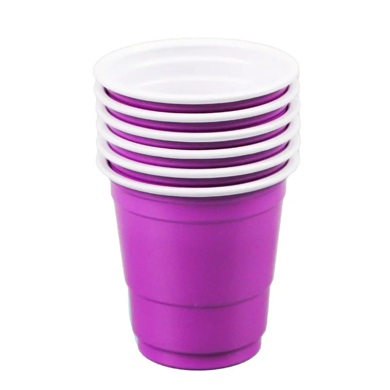 A stack of purple disposable shot glasses with white lids.
