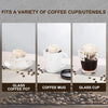 A white coffee mug, glass cup, and coffee pot are shown alongside coffee beans.