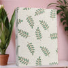 Quadern-Linen-Album mit hellem Beige-Hintergrund und wiederkehrendem grünen Blättermuster