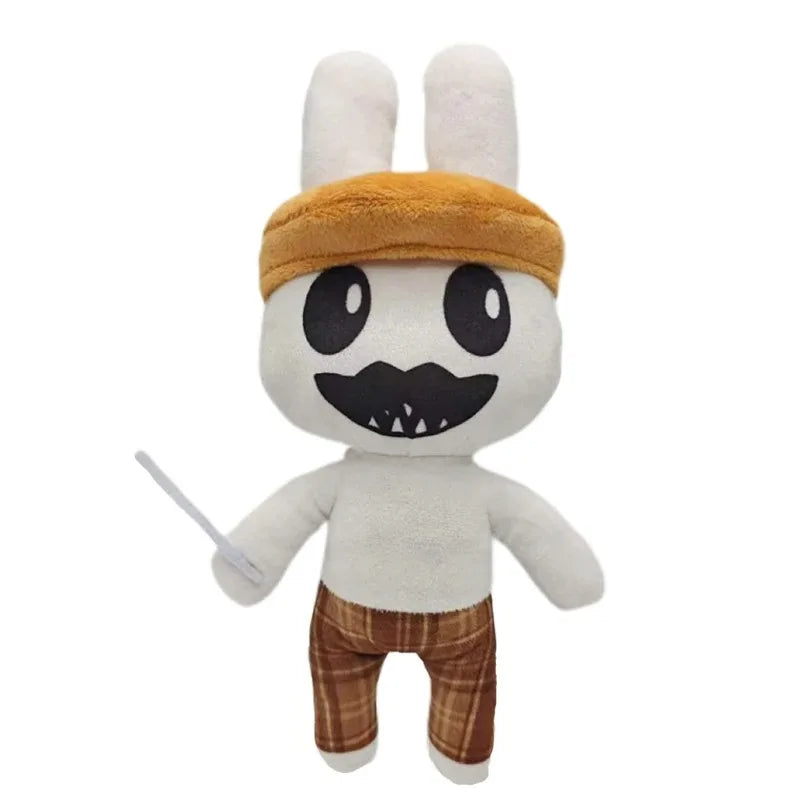 A plush toy of a dog wearing a brown bandage and plaid pants with a stitched mouth.