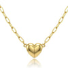 A delicate gold-colored chain necklace featuring a heart pendant with a magnetic clasp.
