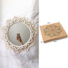 A round macrame wall mirror with a fringed border is shown next to its packaging box.