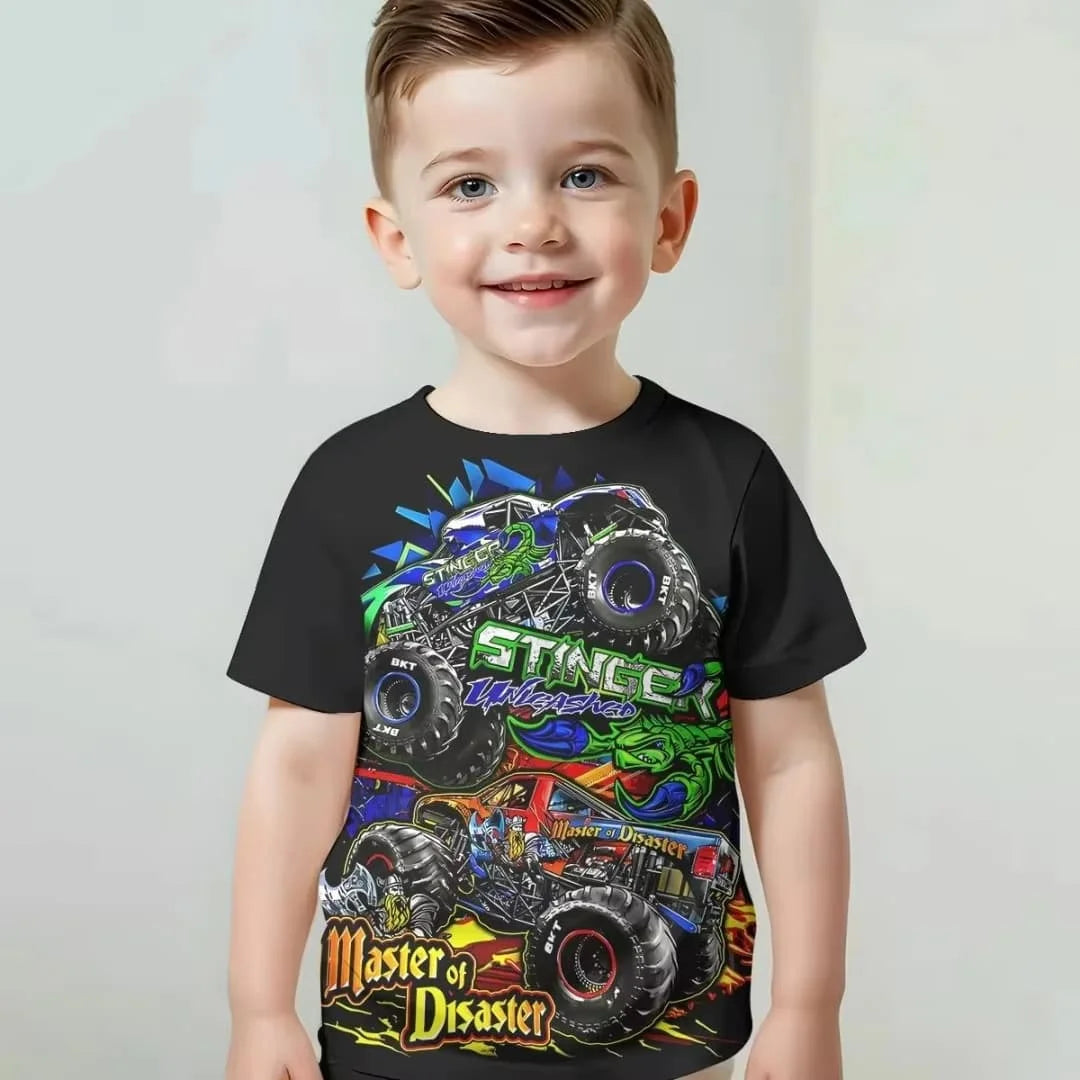 A young boy wearing a black t-shirt with a full graphic print of the Monster Jam Grave Digger vehicle.