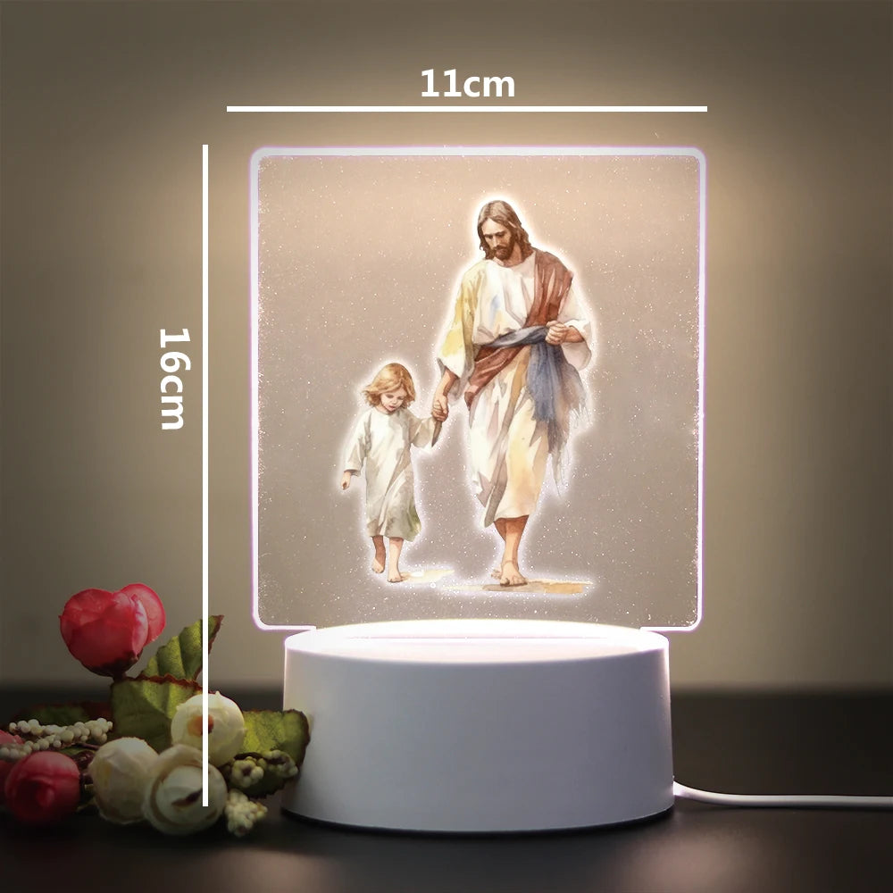 A 3D LED night light featuring a painting of Jesus and a child, illuminated with soft light.