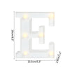 A white alphabet letter E light fixture with warm white LED lights.