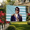 A framed photograph of Michael Jackson wearing sunglasses and a sparkly jacket against a patriotic striped background.