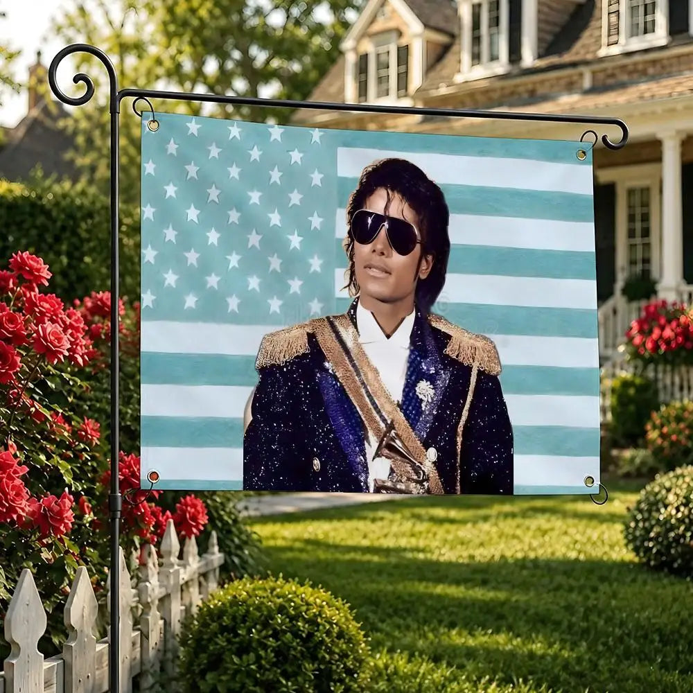 A framed photograph of Michael Jackson wearing sunglasses and a sparkly jacket against a patriotic striped background.
