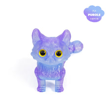 A purple 3D printed cat figurine with large yellow eyes and an articulated tail.