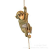 Handmade resin climbing monkey figurine used for patio decor