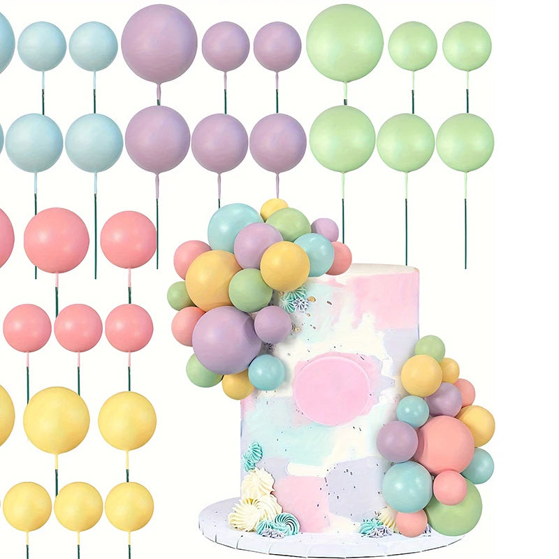 A set of 20 pastel colored ball cake toppers in various shades of pink, green, and blue on thin sticks.