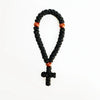 Handmade black prayer rope with wooden beads and a cross charm