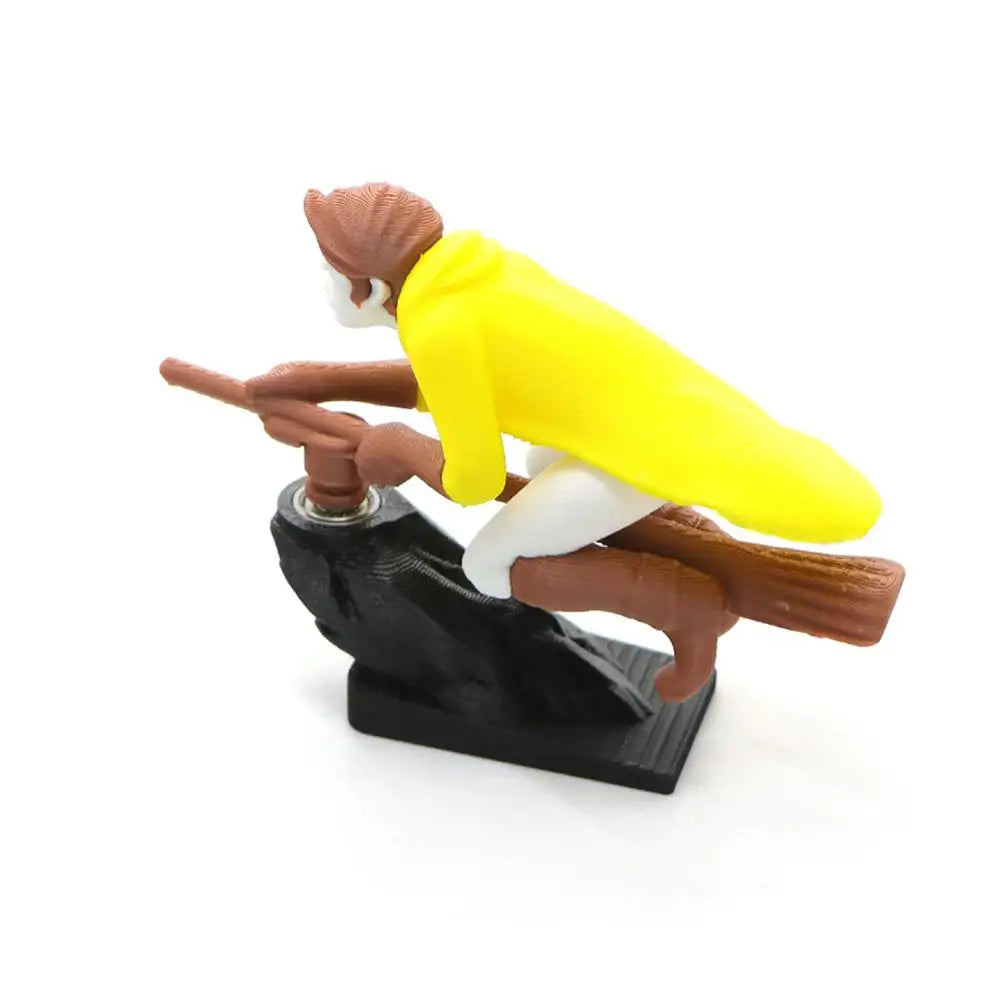 A miniature figurine of a witch and wizard flying carriage dashboard drift decor featuring brown, yellow, and white elements.