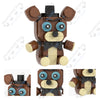A brown and tan collectible DIY model of a bear character built from building blocks.