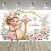 A floral backdrop for a First Communion featuring a young girl, a wooden cross, and doves.