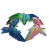 Articulated 3D printed parrot figurine with movable wings in vibrant green and pink colors