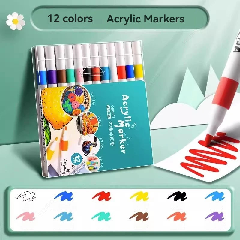 A set of 12 colored acrylic markers in a plastic case with various tips and an open marker drawing on white paper.