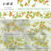 Collection de ruban adhésif pour masquage vert naturel, montrant diverses branches avec de petites fleurs orange.