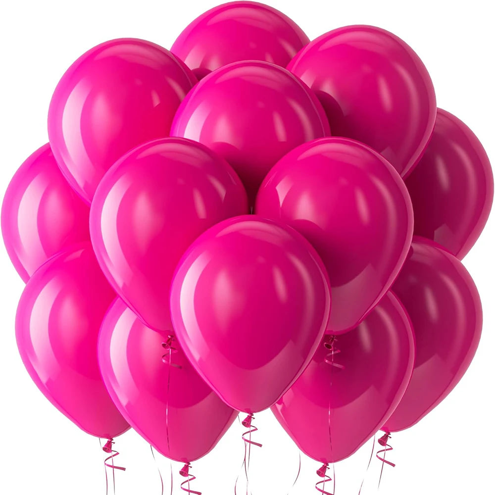 A cluster of bright pink latex balloons, some heart-shaped, floating against a white background.