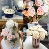 A close-up of various lifelike foam roses in shades of pink and white used for wedding and home décor.