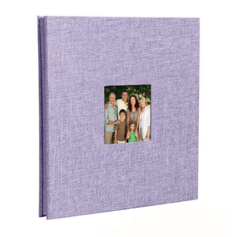 A purple linen front scrapbook memory book with a photo of a family.