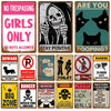 A collection of vintage humorous tin signs featuring warnings and jokes like No Trespassing Girls Only Are You Pooping and Da