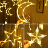 Hands hold a glowing crescent moon and star LED light decoration against a soft background.